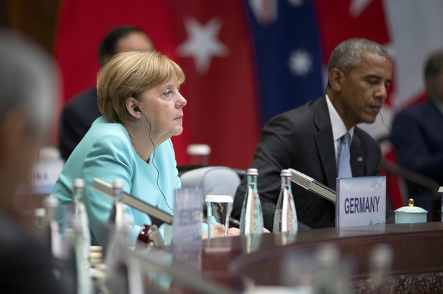 German Chancellor Angela Merkel, left, and U.S. President Barack Obama, right
