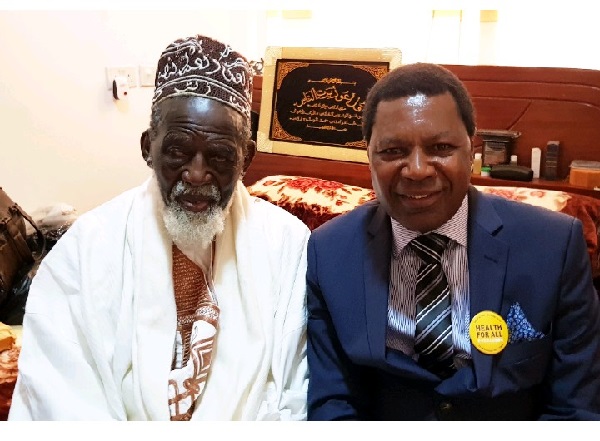   His Eminence Dr. Sheikh Usman Nuhu Sharubutu in a picture with NHIA CEO, Dr. Samuel Annor 