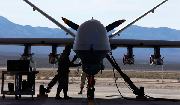 An MQ-9 Reaper remotely piloted aircraft (RPA) gets  prepared for a training mission at Creech Air Force Base, Nevada, on Nov. 17, 2015.