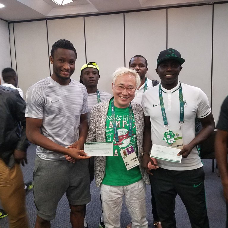 Dr. Katsuya Takasuhas with Mikel Obi