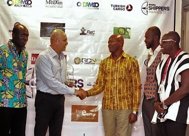 Sea & Shore Executives (left) receiving the award