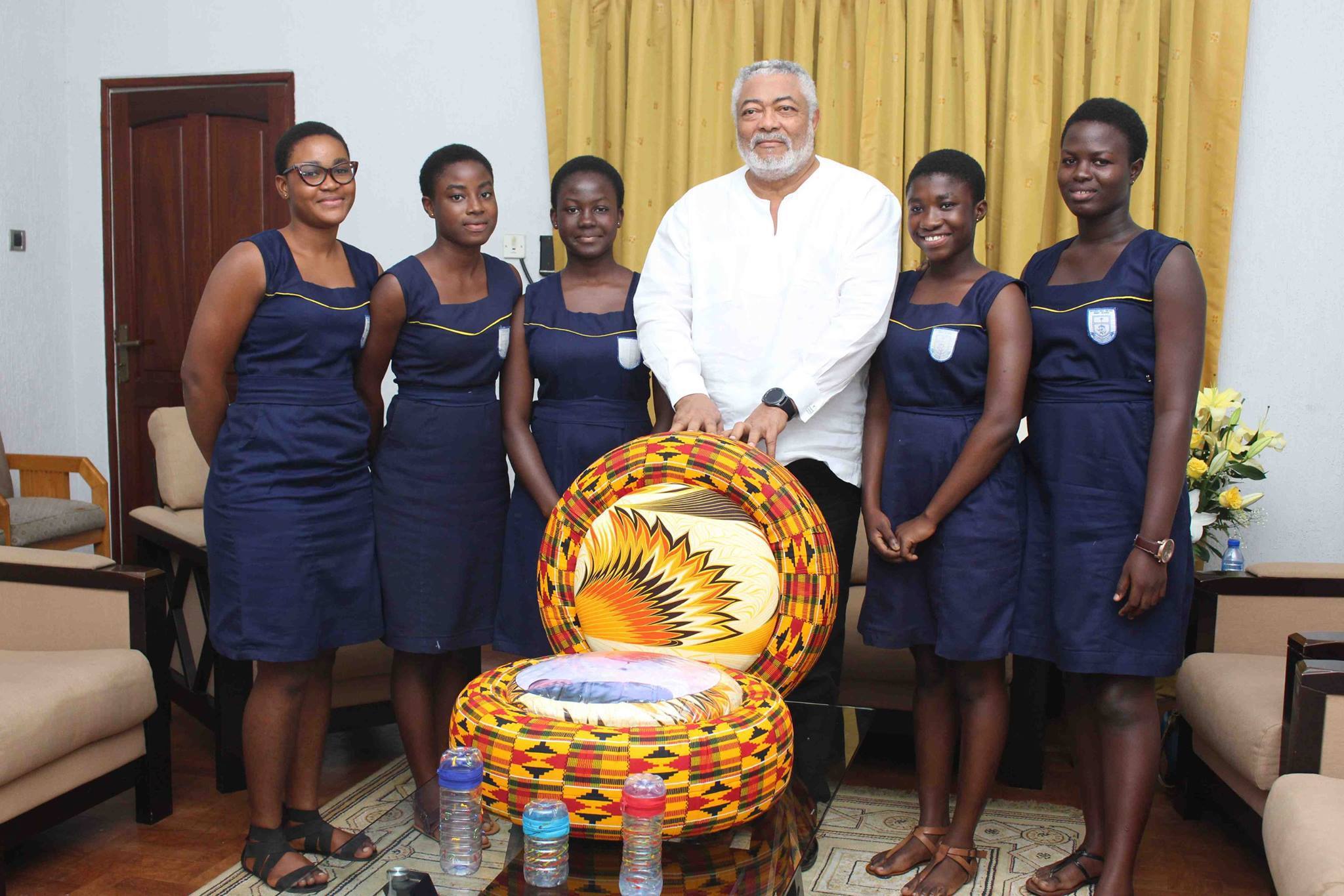 Ex president Rawlings with students from Methodist Girls' SHS, Mamfe