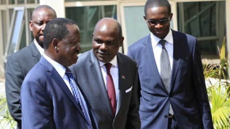 NASA presidential candidate Raila Odinga, IEBC Chairman Wafula Chebukati and CEO Ezra Chiloba