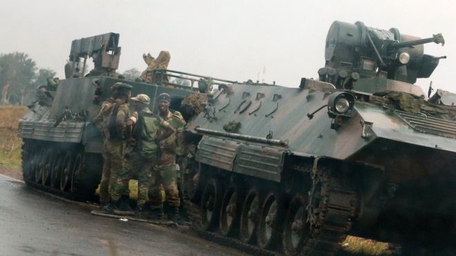 Armoured vehicles were seen taking up positions on roads outside Harare on Tuesday