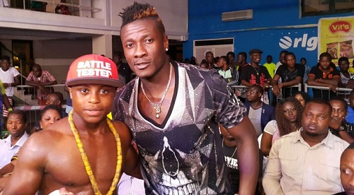Isaac Dogbe(left) and CEO of Baby Jet Promotions Asamoah Gyan