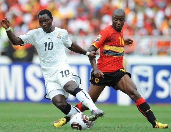 Kwadwo Asamoah of Ghana and Djalma of Angola during the Africa Cup of Nations Quarter Final match between Angola and Ghana from the November 11 Stadium on January 24, 2010 in Luanda, Angola.