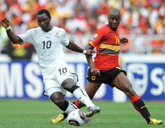 Kwadwo Asamoah of Ghana and Djalma of Angola during the Africa Cup of Nations Quarter Final match between Angola and Ghana from the November 11 Stadium on January 24, 2010 in Luanda, Angola.