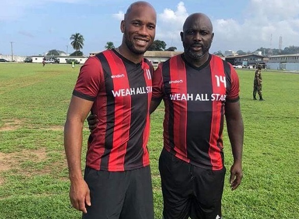 Didier Drogba joins Liberian President George Weah for a charity game 