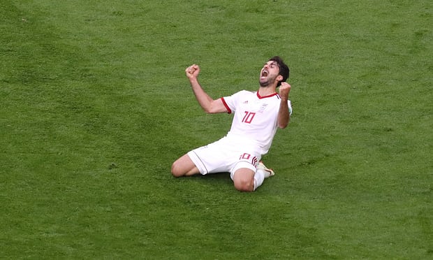  Iran’s Karim Ansarifard celebrates victory