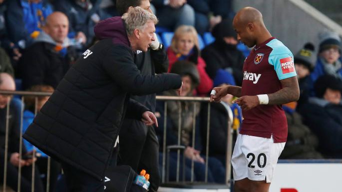 David Moyes(left) says Andre Ayew(right) did not want to stay at West Ham