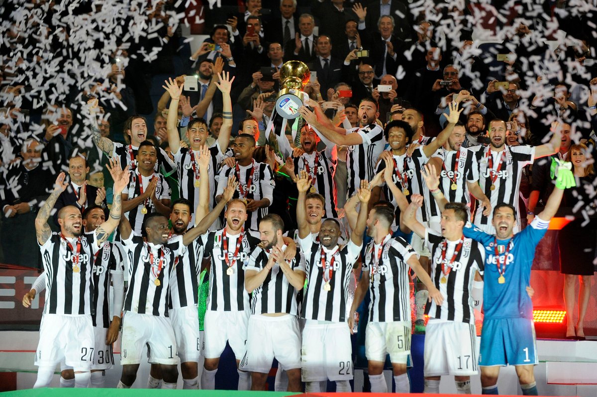 Juventus players including Kwadwo Asamoah celebrate their victory over Milan in the final of the Coppa Italia