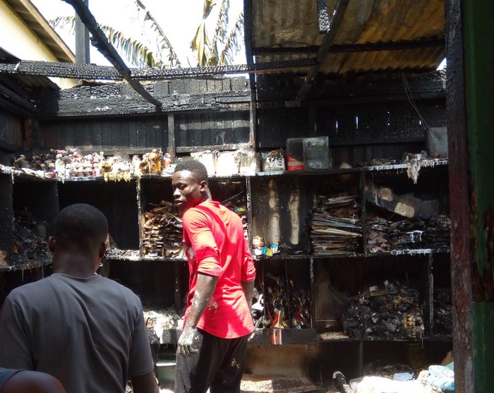 Shop owner collapses after fire guts shop