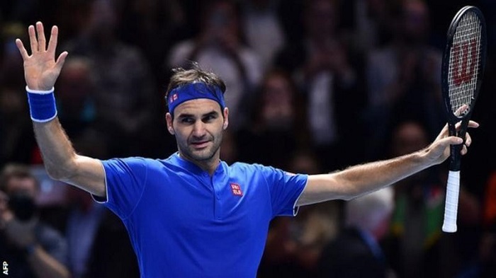 Roger Federer beats Kevin Anderson to top group at ATP Finals in London