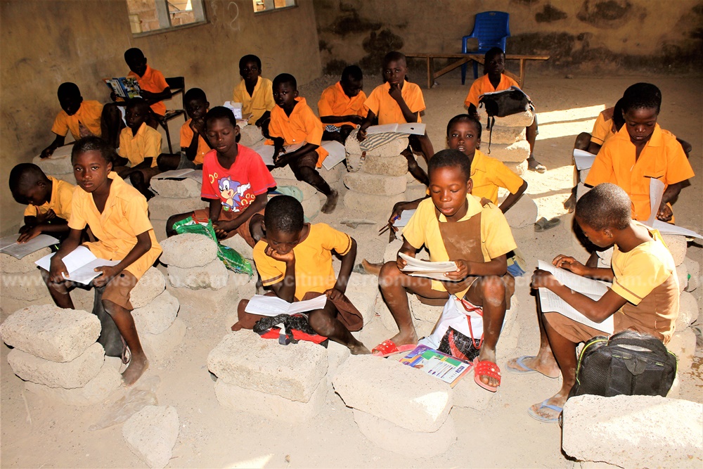Bolgatanga_:School Children of Abalato primary use cement blocks as furniture
