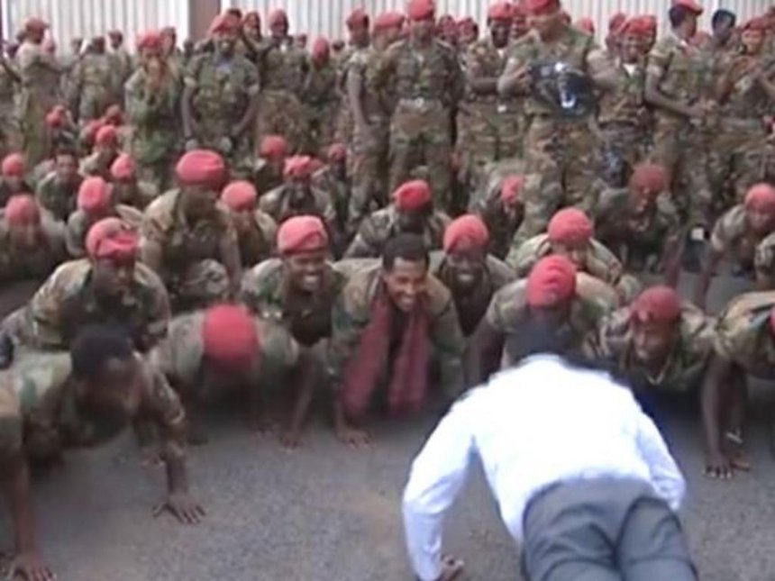 The smiles on the soldiers' faces suggest the prime minister succeeded in defusing the situation amicably. /BBC