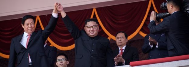 Kim Jong-un (c) appeared alongside visiting Chinese politican Li Zhanshu