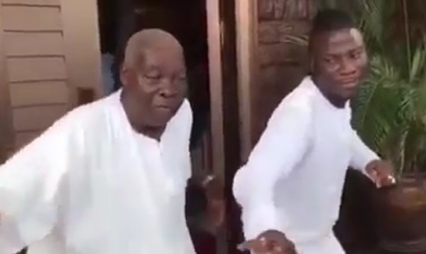 Stonebwoy in a dance battle with dad at son's naming ceremony