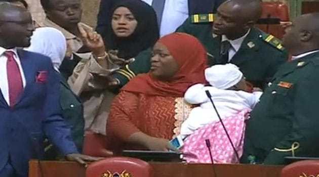Kenyan MP kicked out of parliament for carrying baby