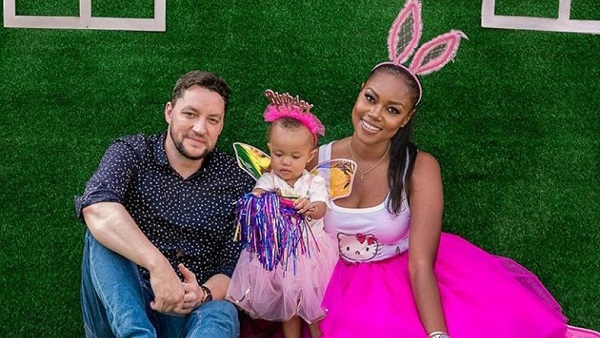Yvonne Nelson with her husband and daughter