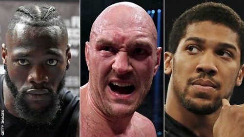 Joshua (right) has offered to help Fury prepare to face Wilder (left)
