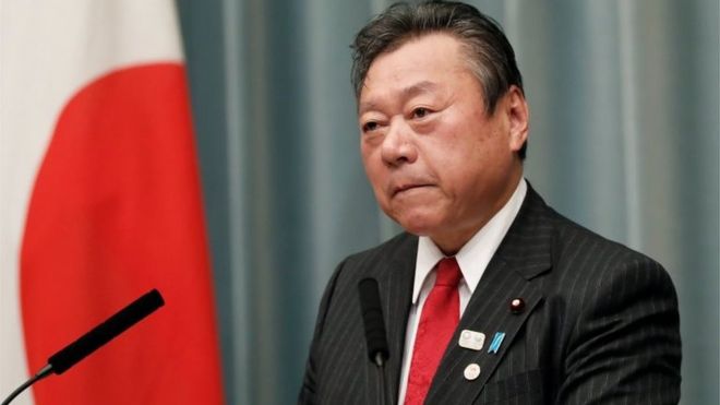 Japan's Olympics Minister, apologises for being three minutes late to a parliamentary meeting