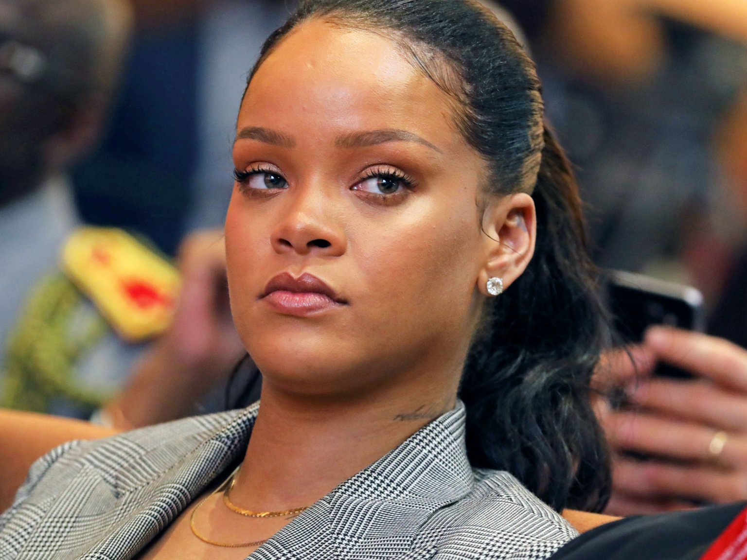 Rihanna is suing her father for exploiting Fenty name