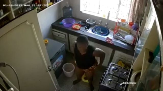  House girl caught on CCTV defecating in the Kitchen