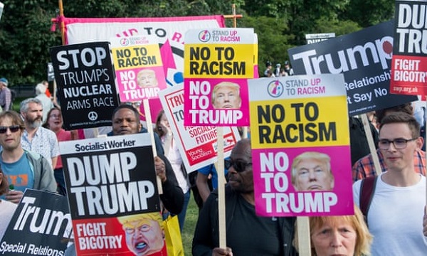 Protesters gather outside Buckingham Palace to demonstrate against the Donald Trump state visit Photograph: RMV/REX/Shutterstock