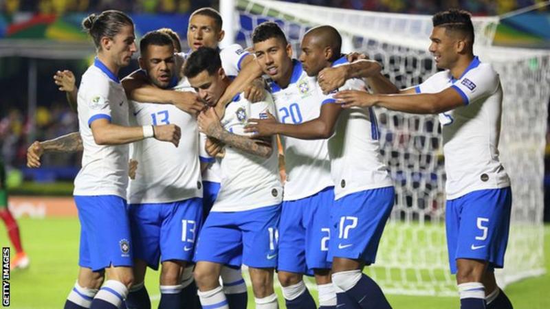 Brazil celebrate Phillipe Coutinho's second goal against Bolivia in the opening game of the Copa America