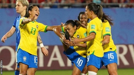Marta becomes World Cup finals leading scorer as Brazil join Italy in last 16