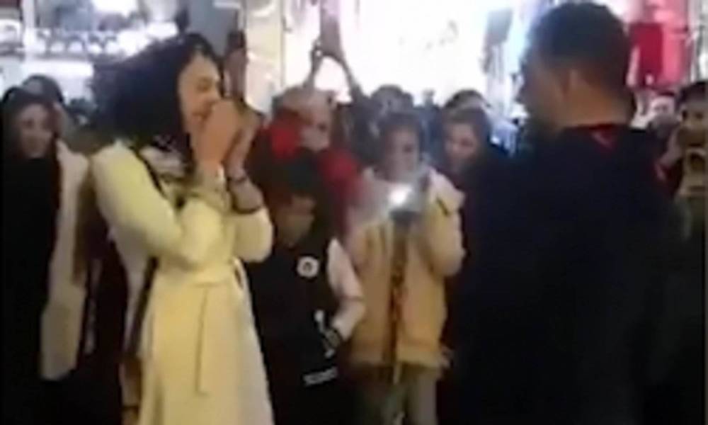 Couple arrested after public marriage proposal goes viral