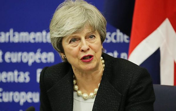 Brexit: Theresa May at Brussels EU summit to urge short delay