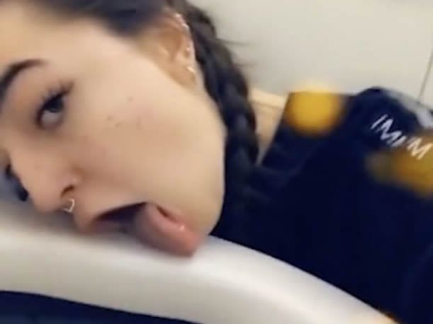 Sex worker shares selfie video licking airplane toilet