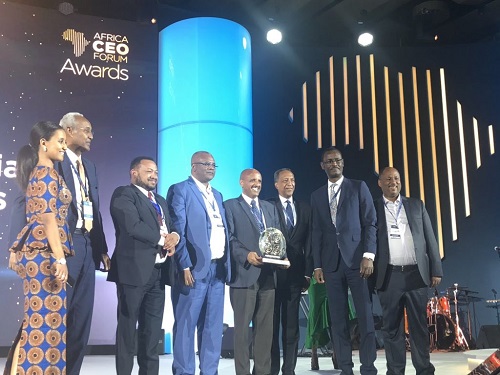 Group CEO Mr. Tewolde GebreMariam (middle) while receiving the Award