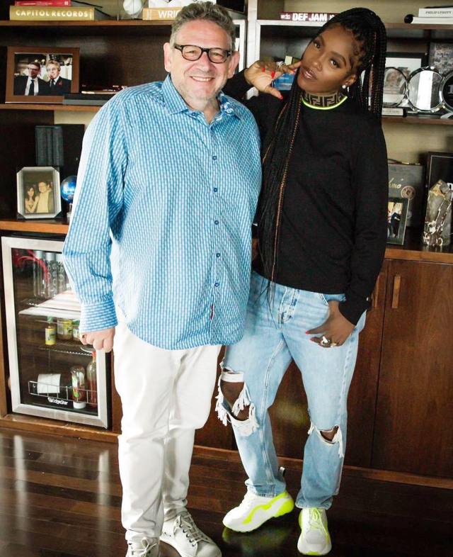 Tiwa Savage pictured above with the CEO of Universal Music Group, Lucian Grainge.