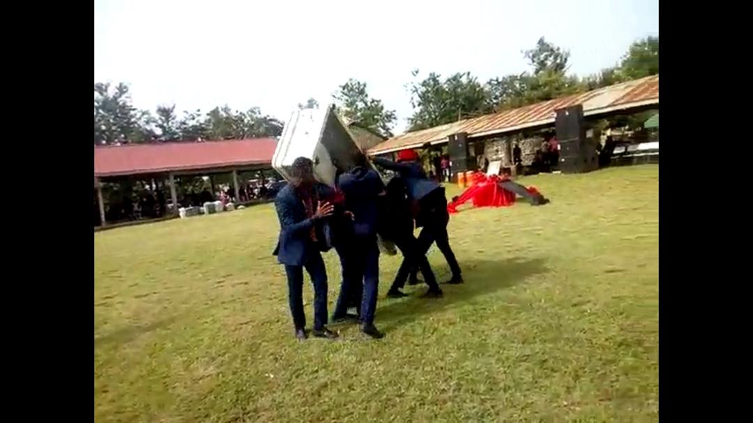 Pallbearers stumble and drop coffin carrying body