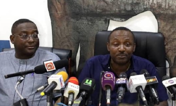 Mr John Boadu (right) addressing the media. On his right is the NPP's Director of Communications, Yaw Boaben Asamoa