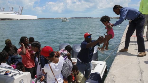 Thousands of people are attempting to flee Great Abaco and Grand Bahama, two of the worst-hit areas