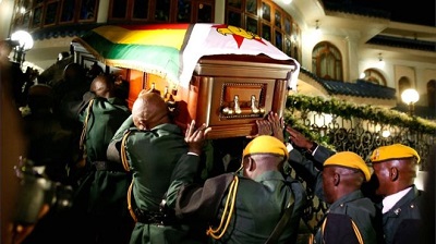 Mr Mugabe's casket arrives at the Blue Roof, his residence in Borrowdale, Harare
