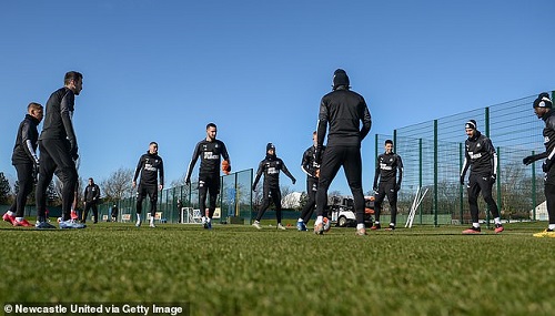 Players and staff greet one another with a handshake every morning at the training ground