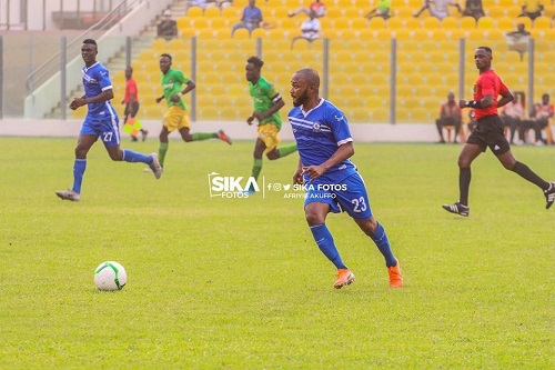Gladson Awako in action for Great Olympics against Aduana Stars