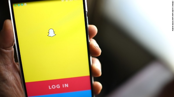 The Snapchat log-in page is displayed on a mobile phone, March 1, 2017, in Glendale, California.