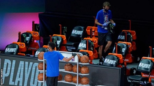 Balls and towels were removed from the Milwaukee Bucks' bench area after they boycotted Wednesday's game