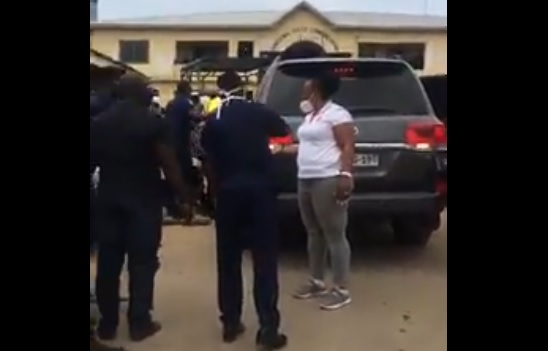 Hawa Koomson in white at registration centre