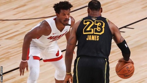 Jimmy Butler pays close attention to LeBron James in game five of the NBA finals