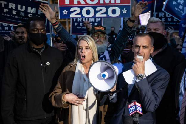 Lewandowski (right) led a rally outside a ballot counting centre in Philadelphia last week