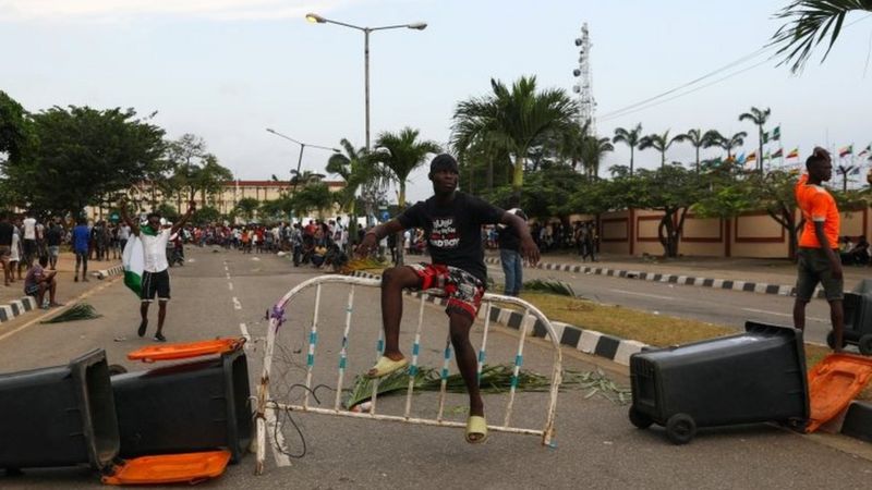 Protesters in Lagos built barricades, blocking roads in Nigeria's commercial hub