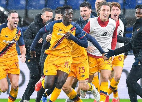 Felix Afena-Gyan celebrates after scoring against Genoa