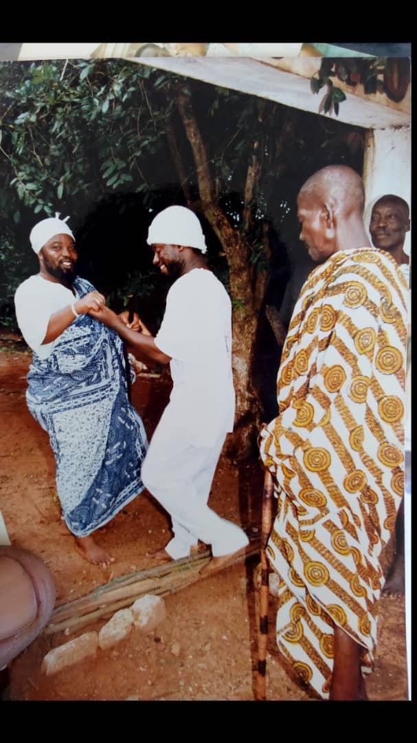 Tsawe Wulomo being initiated by the Gborbu Wulomo Shitse (Overlord of the Gadangme State)