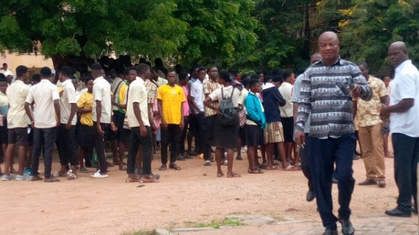 Some students of Bolgatanga Technical Institute watching on as their seniors went on rampage